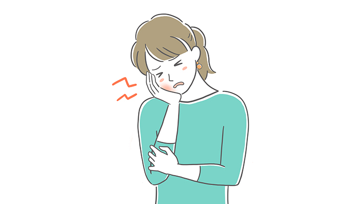 歯を痛めた女性のイラスト